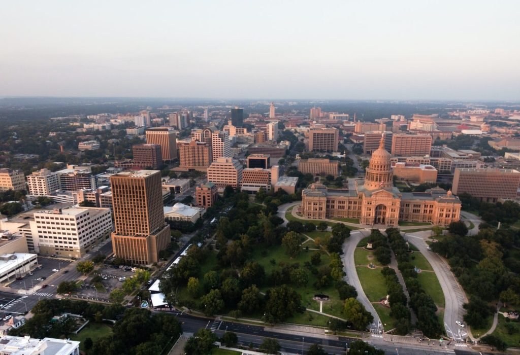 capital-building-austin-texas-government-building-blue-skies-e1625799779986.jpg